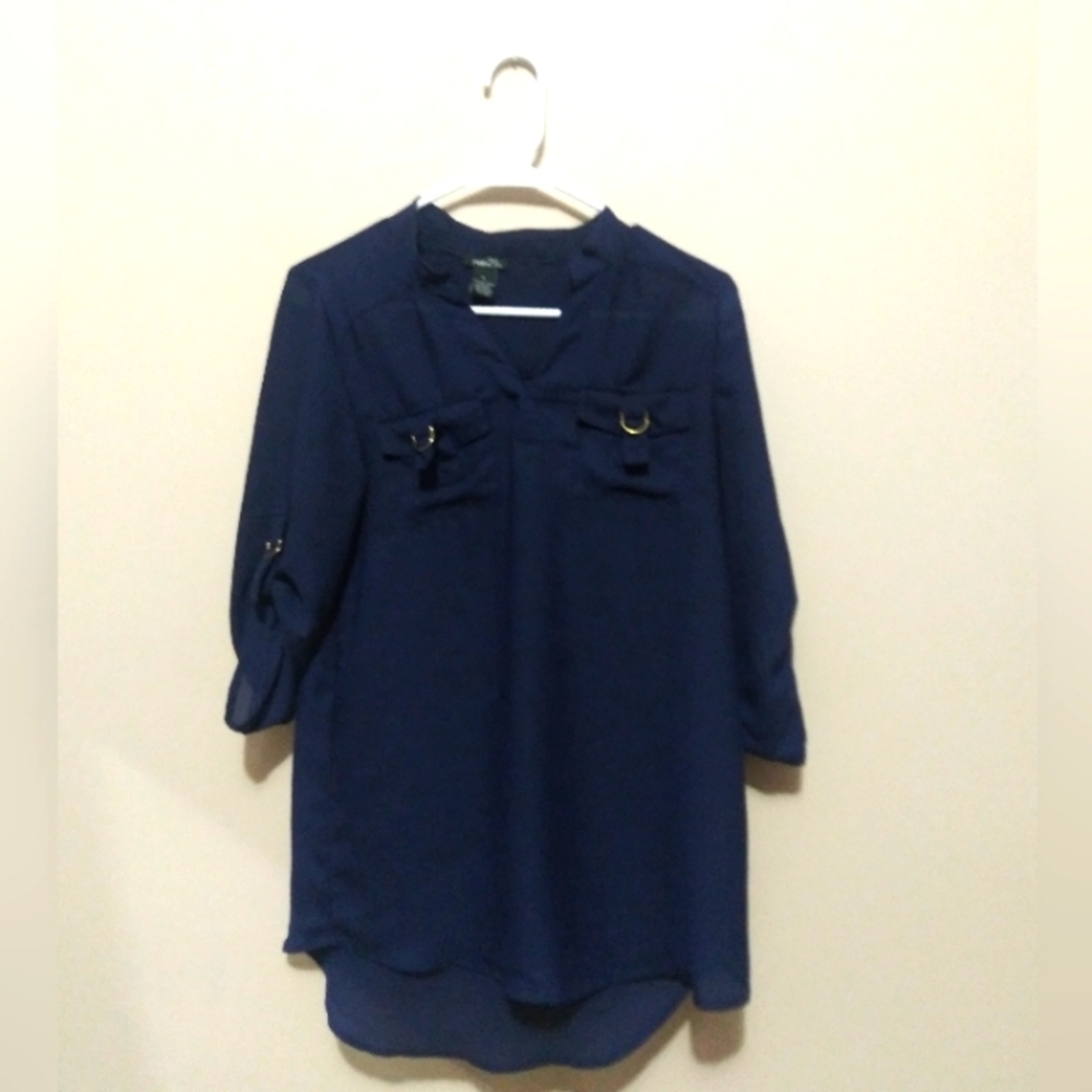 Rue21 blue shirt and the size is small.